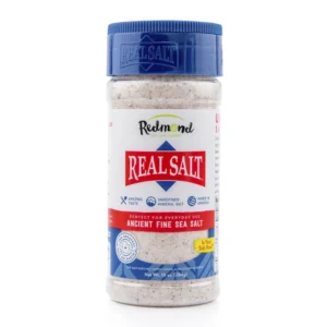 A container of Real Salt with a blue cap.