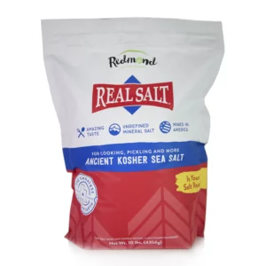 Package of Real Salt Ancient Kosher Sea Salt on white and red background.