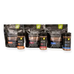 Assorted pet food bags and jars with natural ingredients.