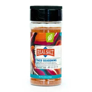 A bottle of taco seasoning labeled 'Real Salt'.